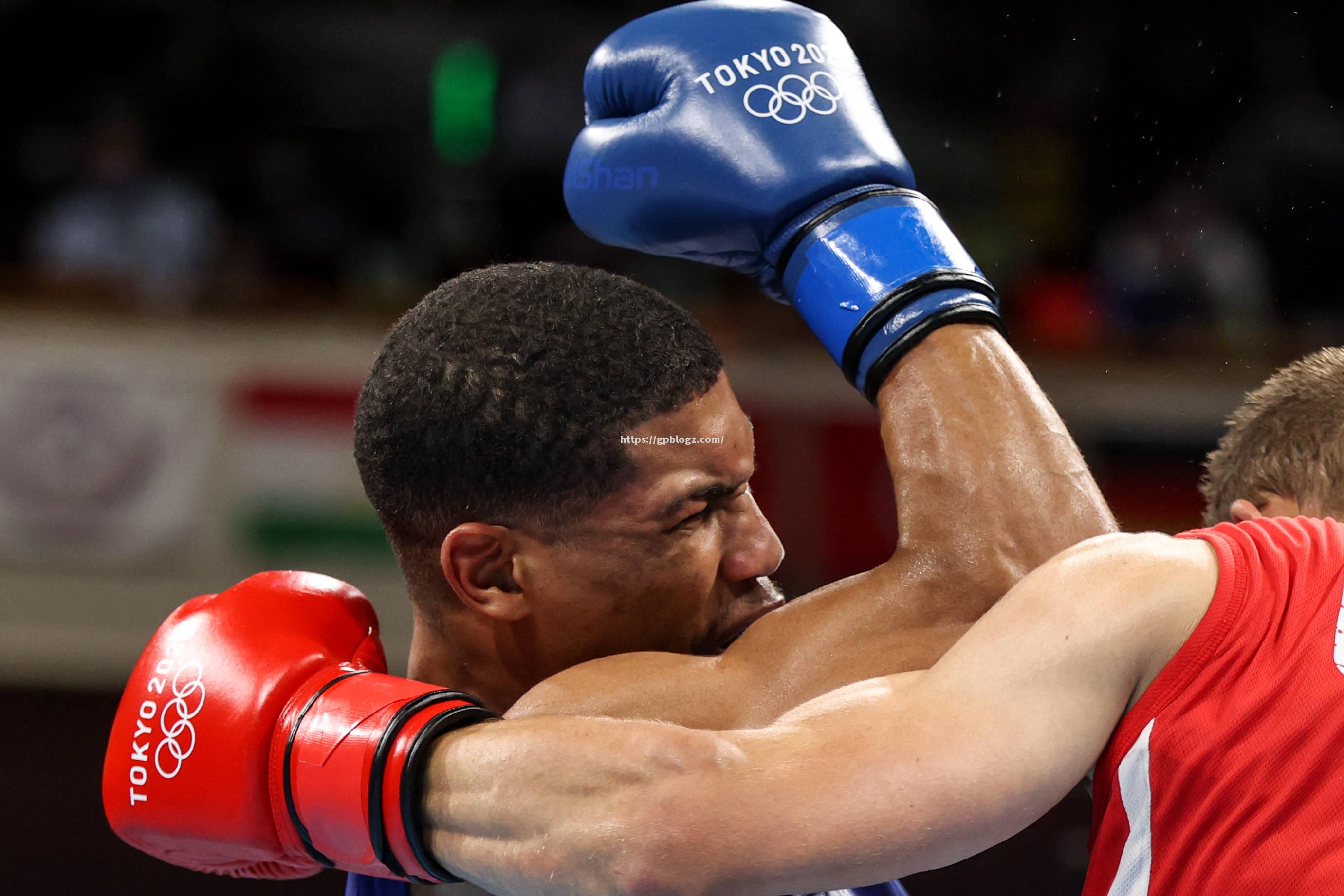 安哥拉拳击选手难能可贵,赢得掌声 安哥拉拳击选手难能可贵,赢得掌声